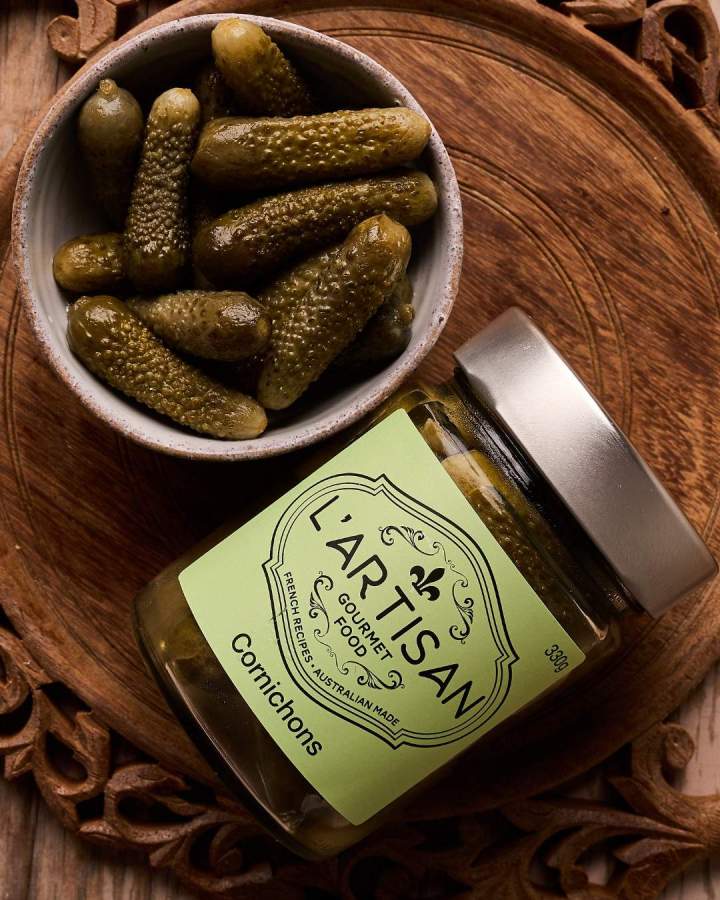  Cornichons are sharp, tangy, and slightly sour, with a satisfying crunch that makes them incredibly refreshing. They cut through rich, fatty foods perfectly and pair beautifully with all types of charcuterie.